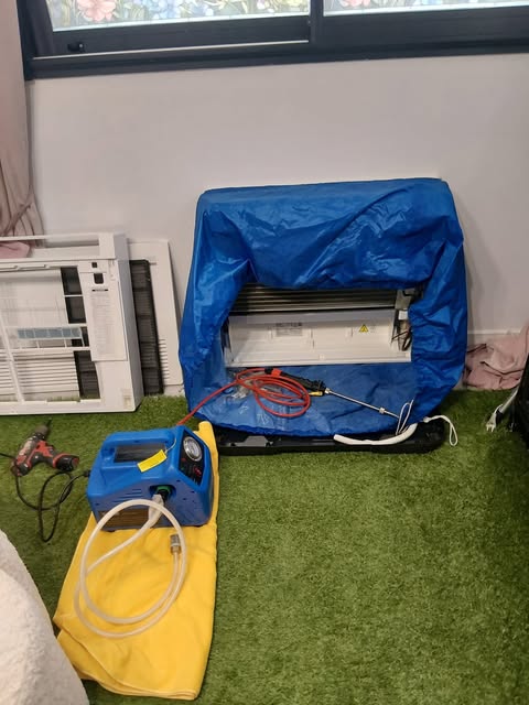 Entretien haute pression d'une console de climatisation